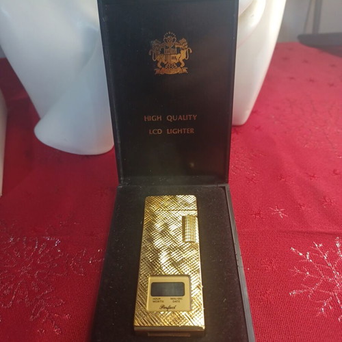 Lcd Gold Lighter with Clock and Date like new