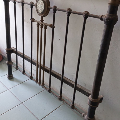 Solid iron bed with brass decorations used