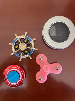 Fidget spinner set of 4 with case like new