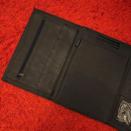 Clutch used, black with gold clasp, leatherette material