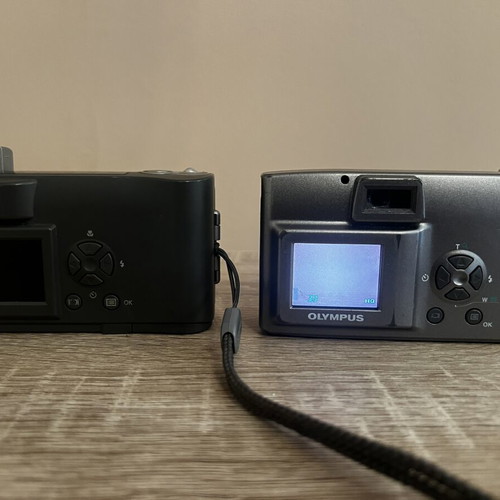 Olympus digital cameras used, pack of 2 with memory included
