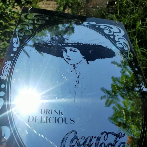 Coca-Cola mirror and picture collection used