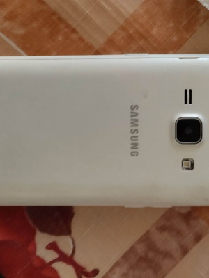 Samsung Galaxy J1 2016 used, white, 1GB RAM, 5MP camera