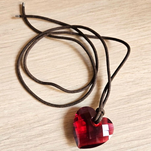Swarovski necklace like new with red heart crystals