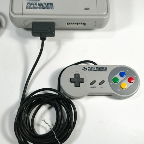 Super Nintendo Entertainment System SNES PAL used with controller and cables
