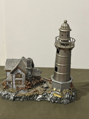 Vintage metal lighthouse decorative miniature with hidden compartment, like new