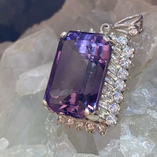 Silver pendant with large cut natural amethyst stone and moissanites