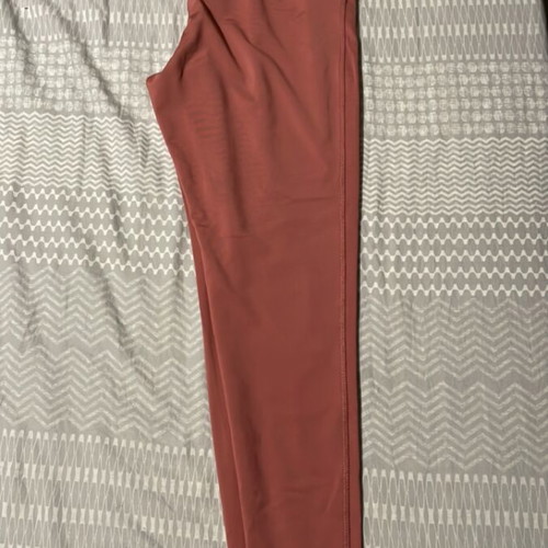 Women's pink gym leggings used, size M