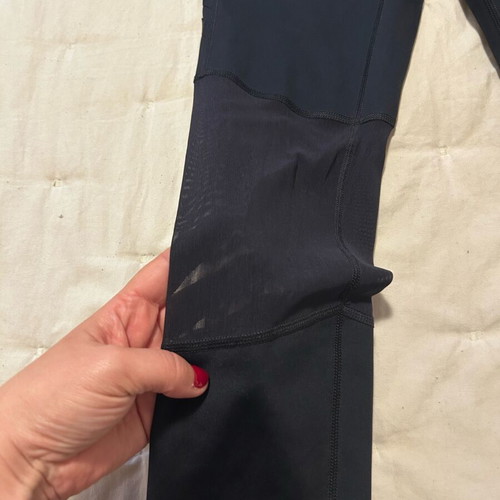 Under Armour leggings like new with corset-style detail black