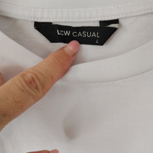 Oversized white T-shirt with front pocket, 100% cotton