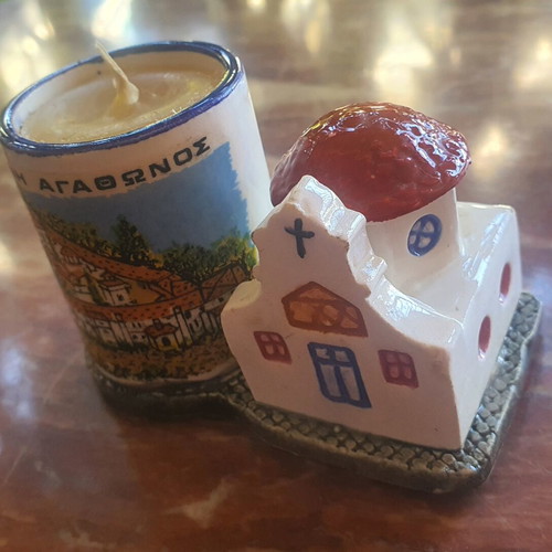 Ceramic church candle holder with candle