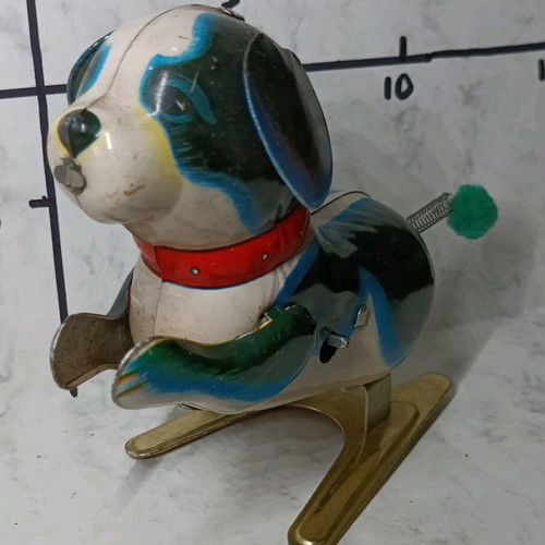 Tin vintage wind-up dog like new, height 12 cm