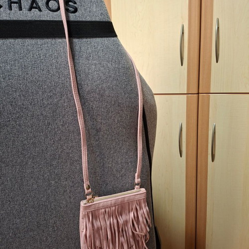 H&M pink crossbody bag for girls used with fringes and gold details