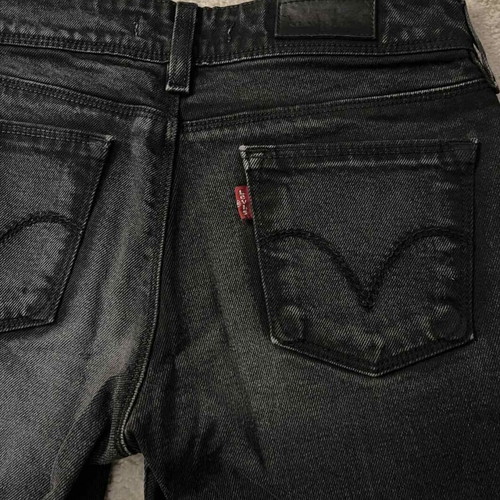 Levi's 570 black jeans used, low-waist with faded effect