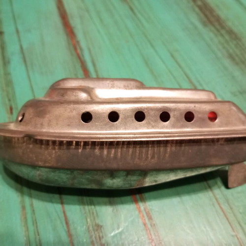 Tin pat pat boat collectible from the 60s