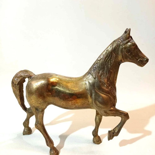 Bronze decorative horse used with carved details