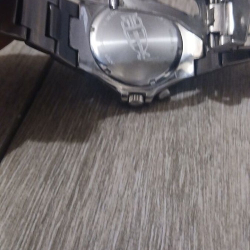 Men's watch like new, working with one battery