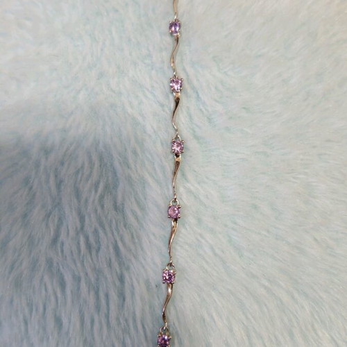 Fairy bracelet like new with purple stones and silver chain