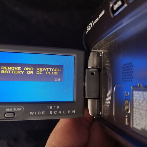 JVC GR-D725E digital video camera used with charger and case