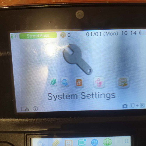 Nintendo 3DS console with charger, memory card and stylus