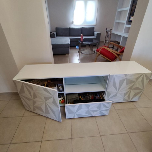 Modern TV stand with geometric design, white and grey