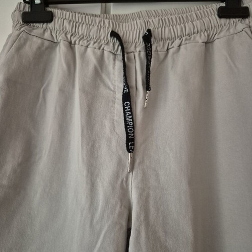 Beige elastic pants size L like new with side pockets and drawstring waist