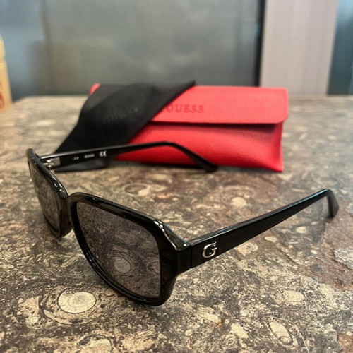 Guess women's sunglasses with red protective case and black cloth