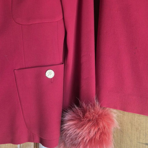 Red women's suit like new with fur cuffs
