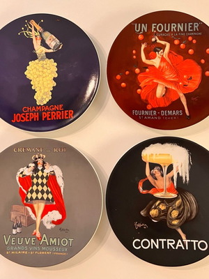 Pottery Barn Champagne collectible plates set of 4 like new