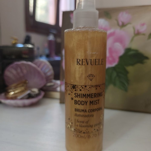 Revuele Shimmering Body Mist 200ml like new, Blooming Garden scent