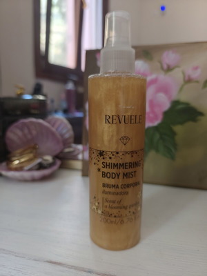 Revuele Shimmering Body Mist 200ml like new, Blooming Garden scent