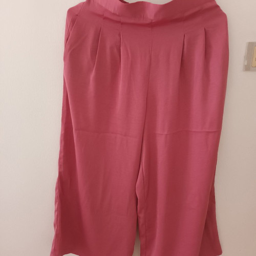 High-waisted pants used, satin fabric