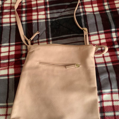 Crossbody bag in nude-pink color like new