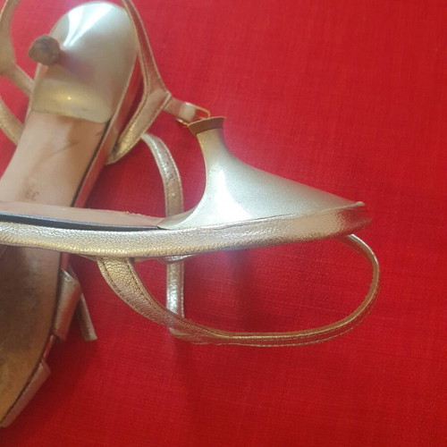 Nak gold sandals with low heel, used condition