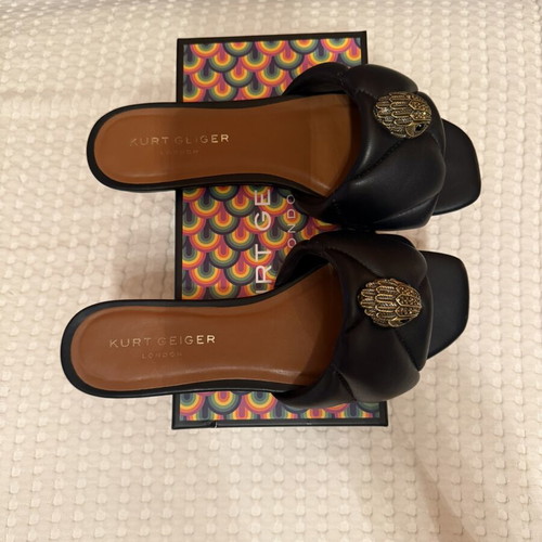 Kurt Geiger black leather sandals with gold emblem, size 40
