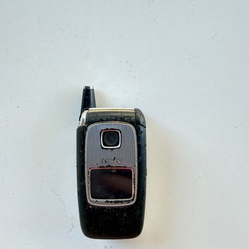 Nokia 6110 and 6103 vintage mobile phones used with chargers