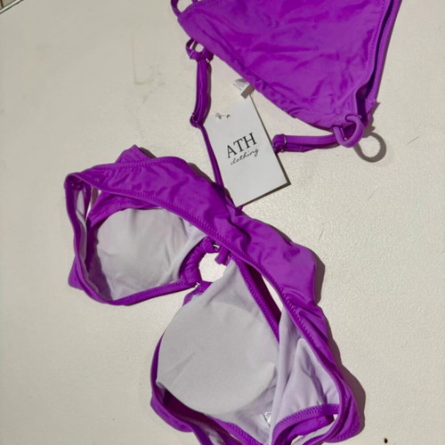 Bikini set new with tags, purple, sizes medium and large