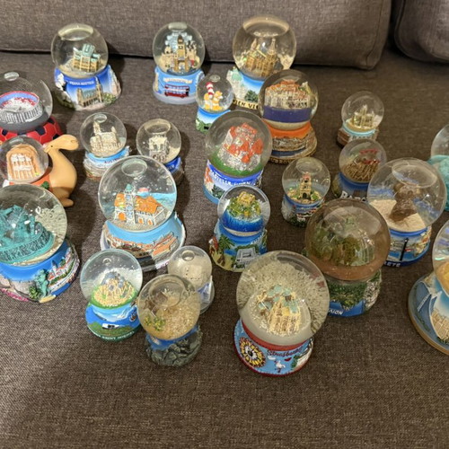 Tourist souvenir snow globes new from various world and Greek locations