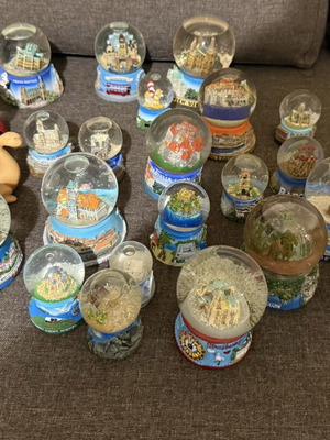 Tourist souvenir snow globes new from various world and Greek locations