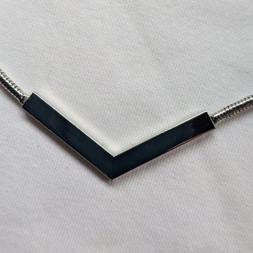 Steel choker necklace in like new condition, silver color