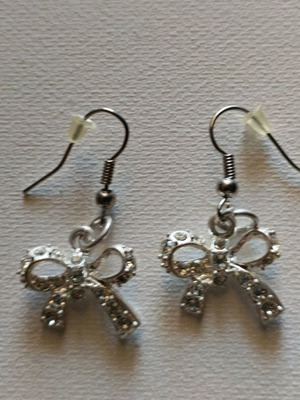 Earrings bow design silver color with small stones new