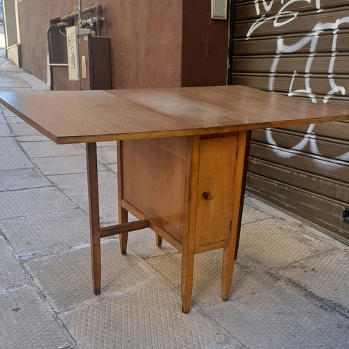 Dining table used with 2 drop-leaves and cabinet with shelf