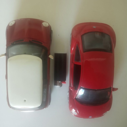 VW Beetle and Mini Cooper toy cars used, scale 1/24