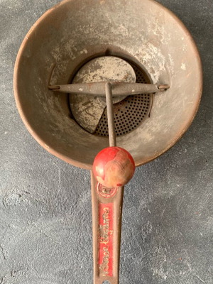 Old household tool used, kitchen item