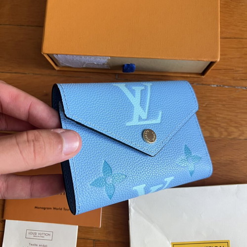 Louis Vuitton wallet like new, blue