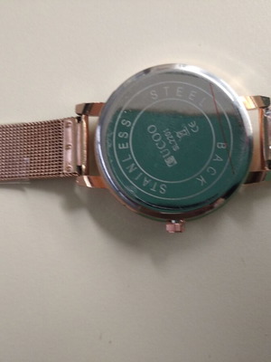Women's watch new with embossed gold butterfly, pink-gold color