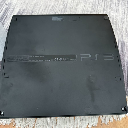 Sony PlayStation 3 Slim 160GB console used with original controller
