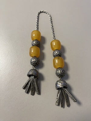 Collectible worry beads with yellow and hammered beads, 23 cm, like new