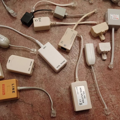 Telephone cables and parts used, switch and splitter included