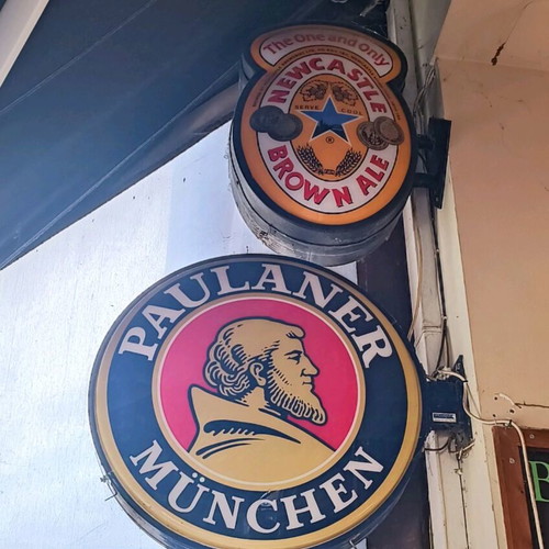 New Castle Brown Ale sign used with small crack